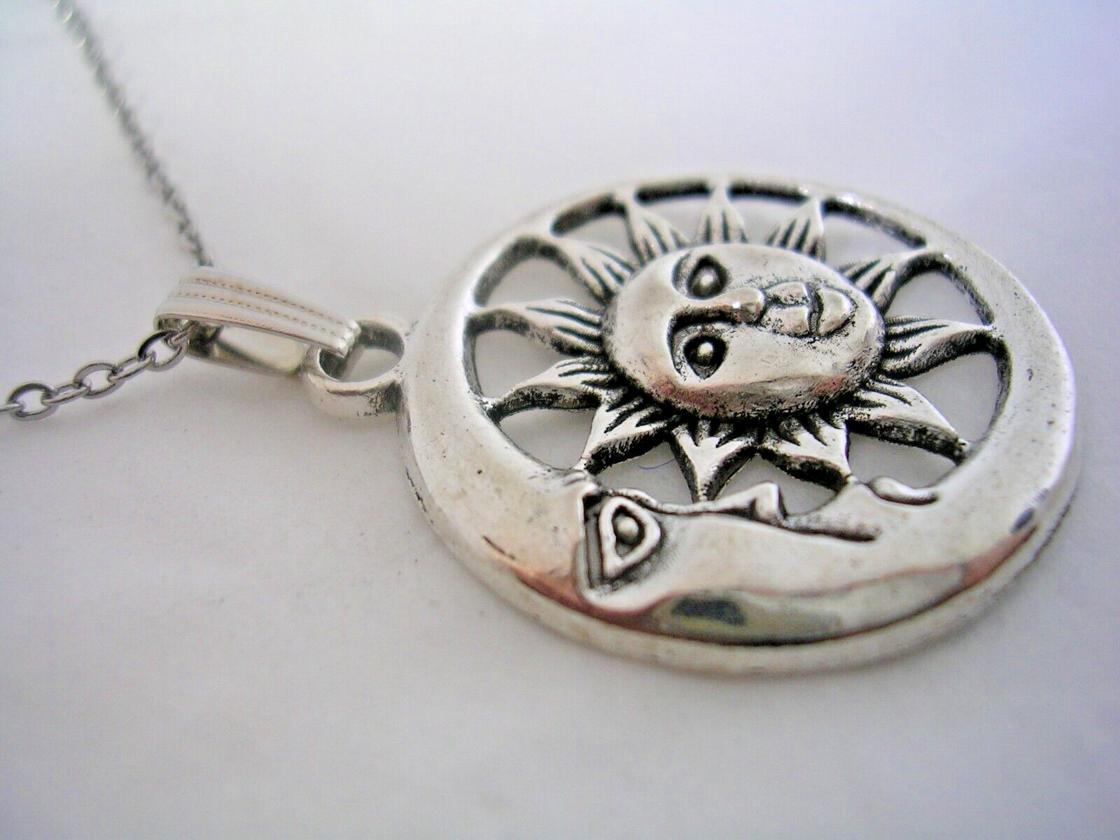 MOON AND SUN PENDANT WITH FACES ALL HIGH POLISHED IN STAINLESS STEEL WITH CHAIN