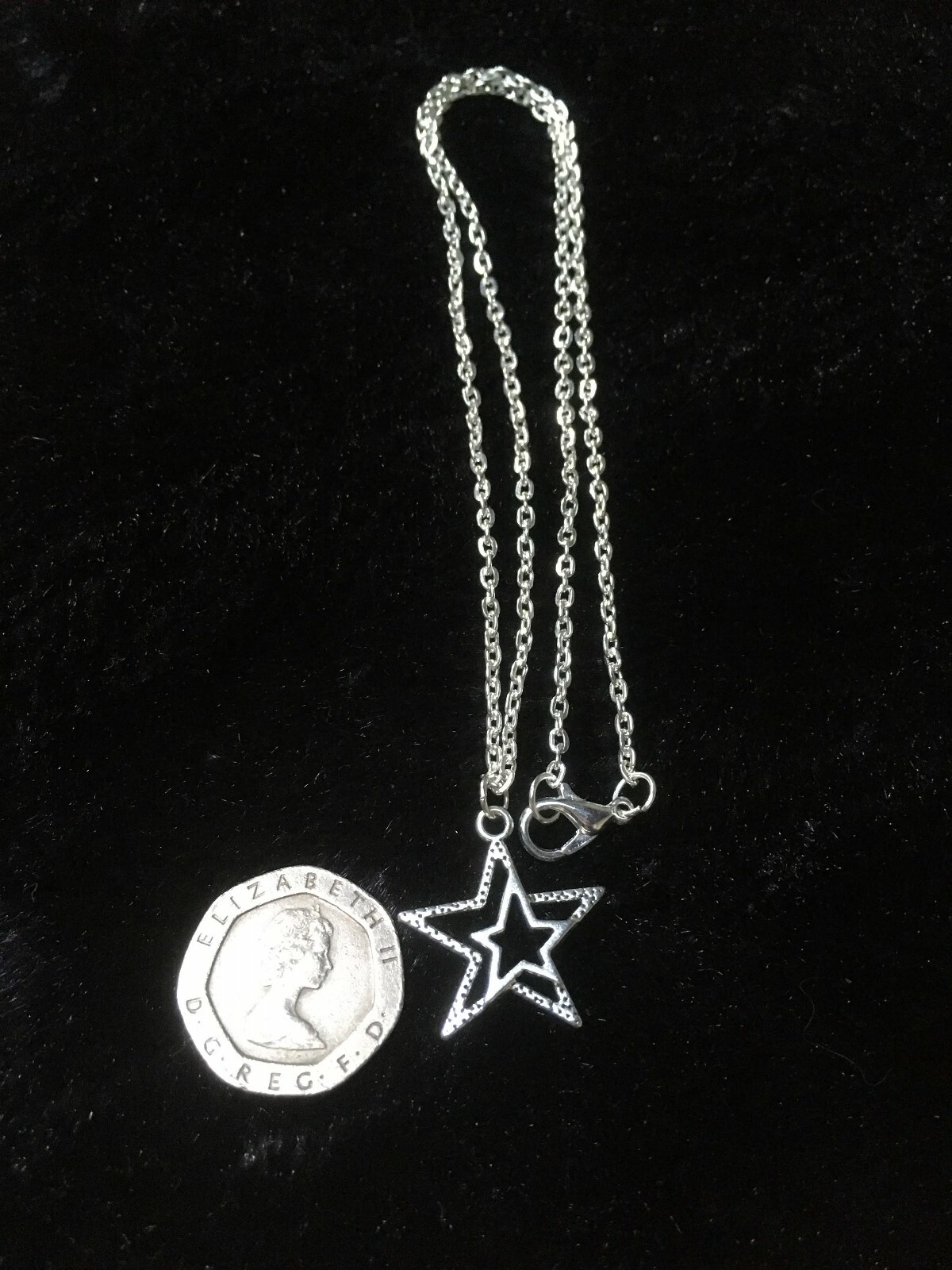 TIBETAN SILVER STAR PENDANT ON SILVER PLATED 16 INCH CHAIN