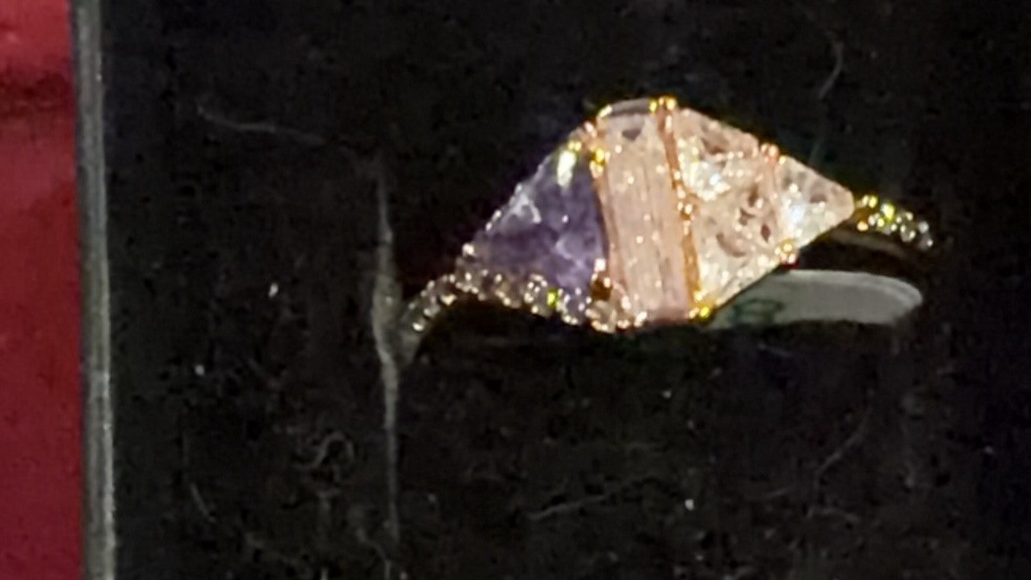 Rose gold no idea on the stones they are a pinkish color