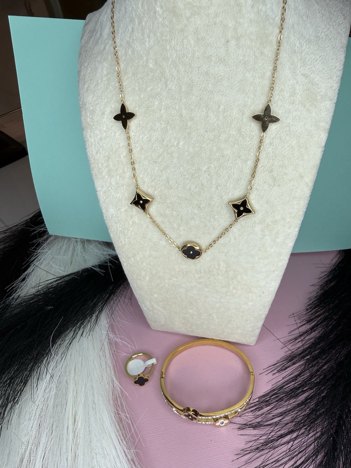 Gold Tone Clover Pendant Cable Chain Necklace with Black Accents