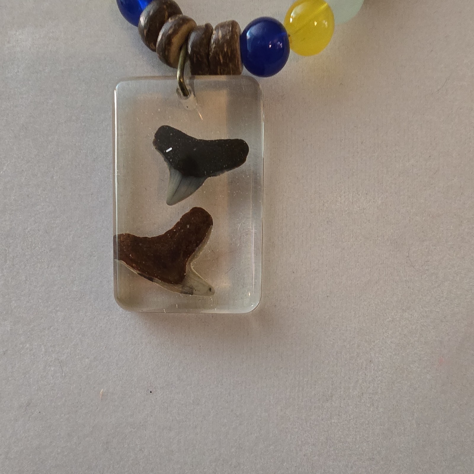 Beaded Necklace with Resin Shark Tooth Pendant, Glass And Coconut Shell Beads