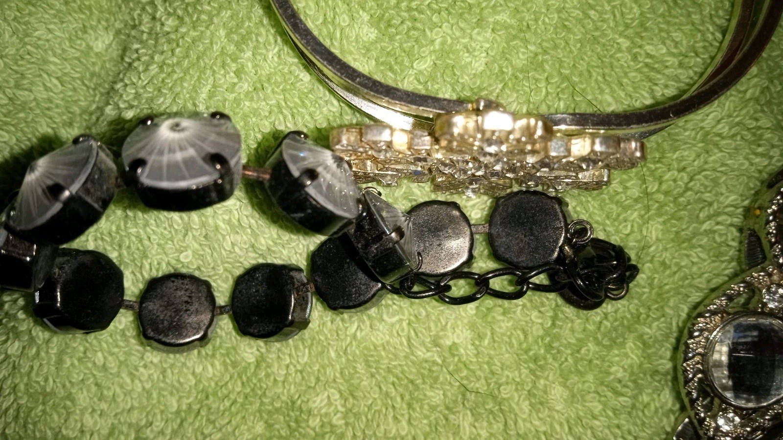 MULTIPLE FASHION BRACELETS MOST STRETCHY BUT SOME PRETTY ONES, SOME SIGNED BRASS