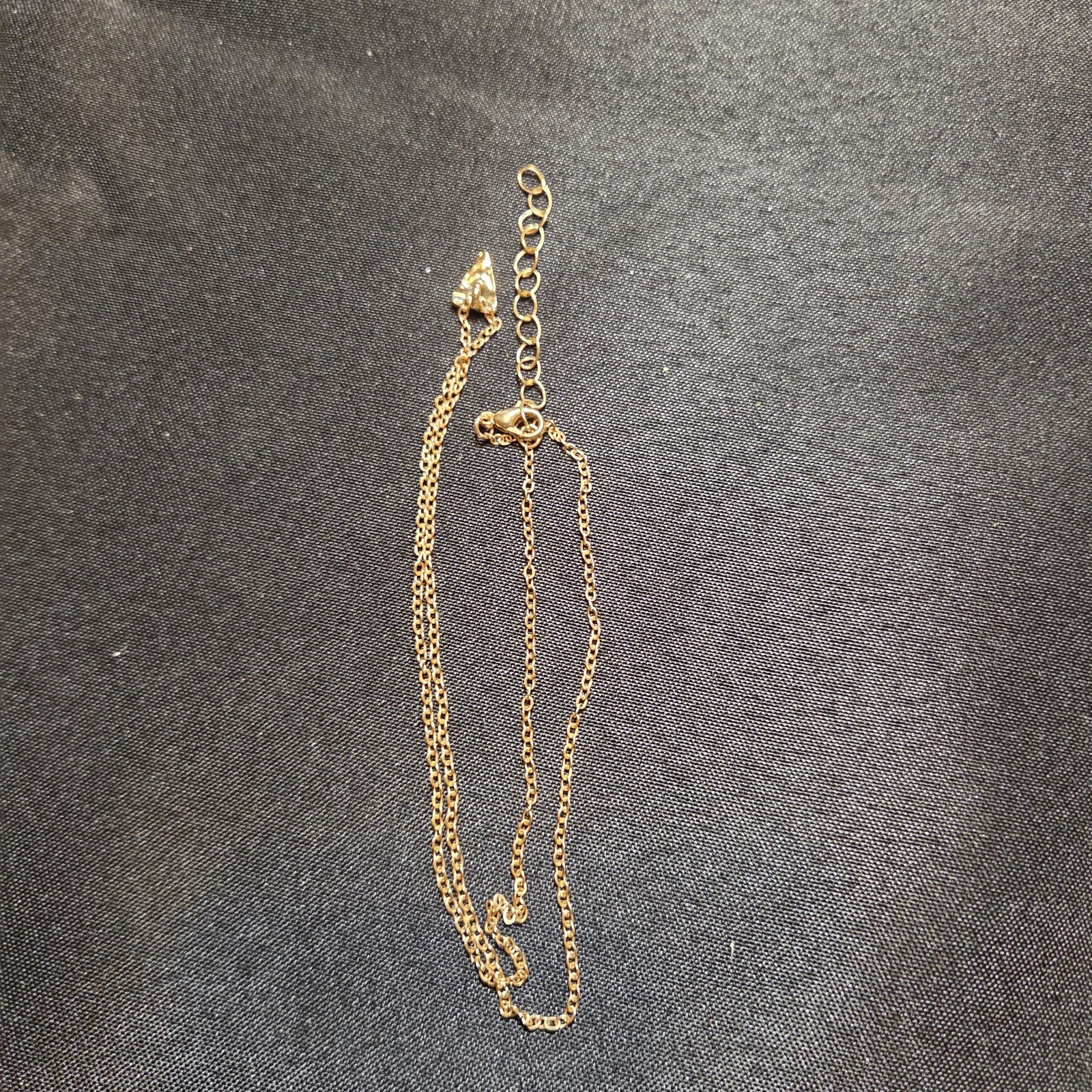Delicate Gold-tone Necklace With Triangle Pendant.