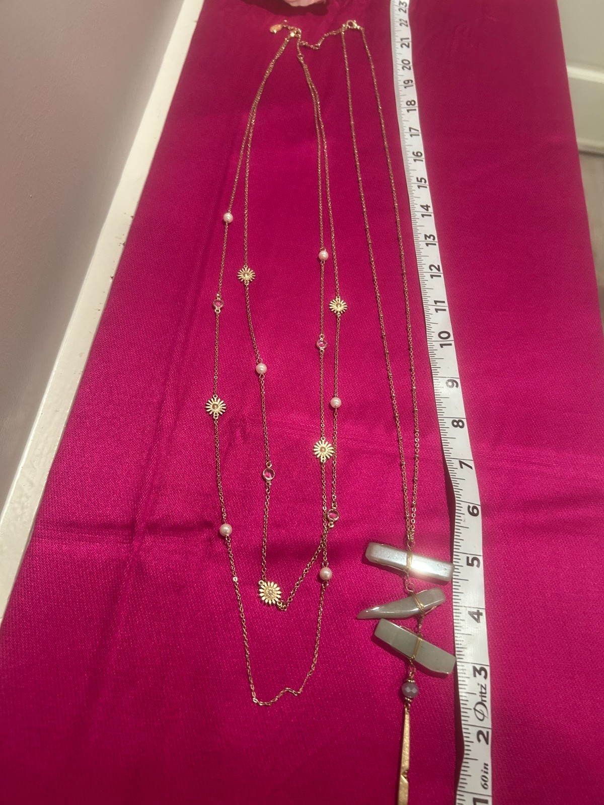 LOTE OF 2 LONG GOLD TONE NECKLACES ANN TAYLOR STAR BURS UMBRANDED STONE BAR PEND