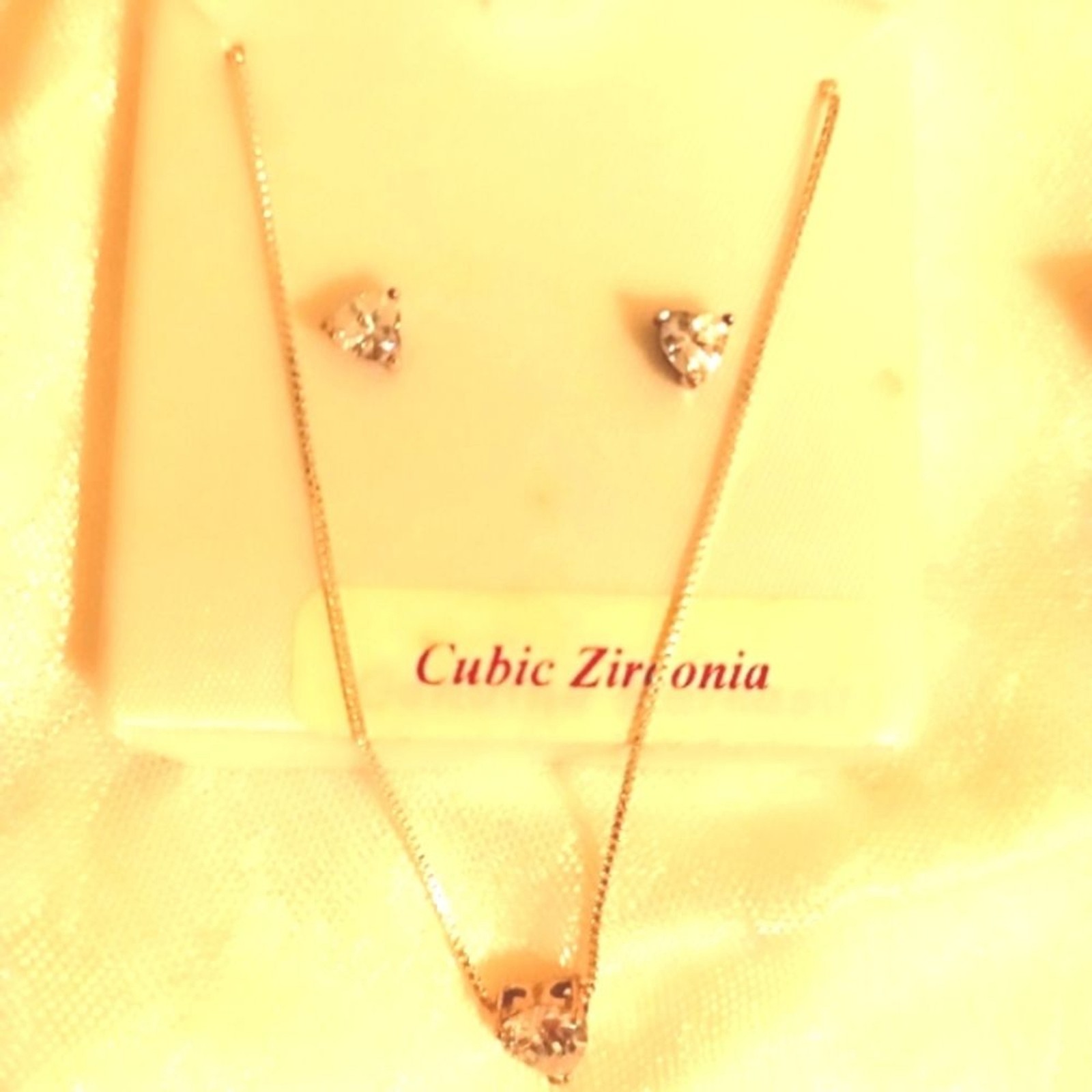 Cubic zirconia heart shaped sterling silver necklace and earrings set
