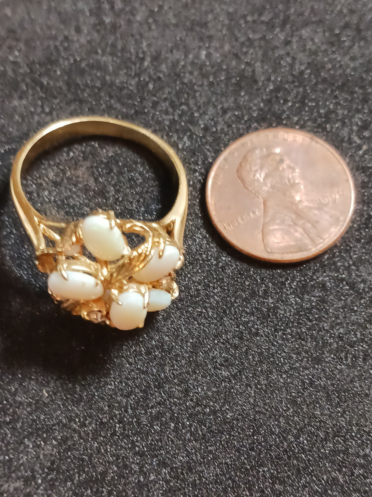 4 Beautiful Rings 3 with no markings 1 stamped M with a Trademark Nice