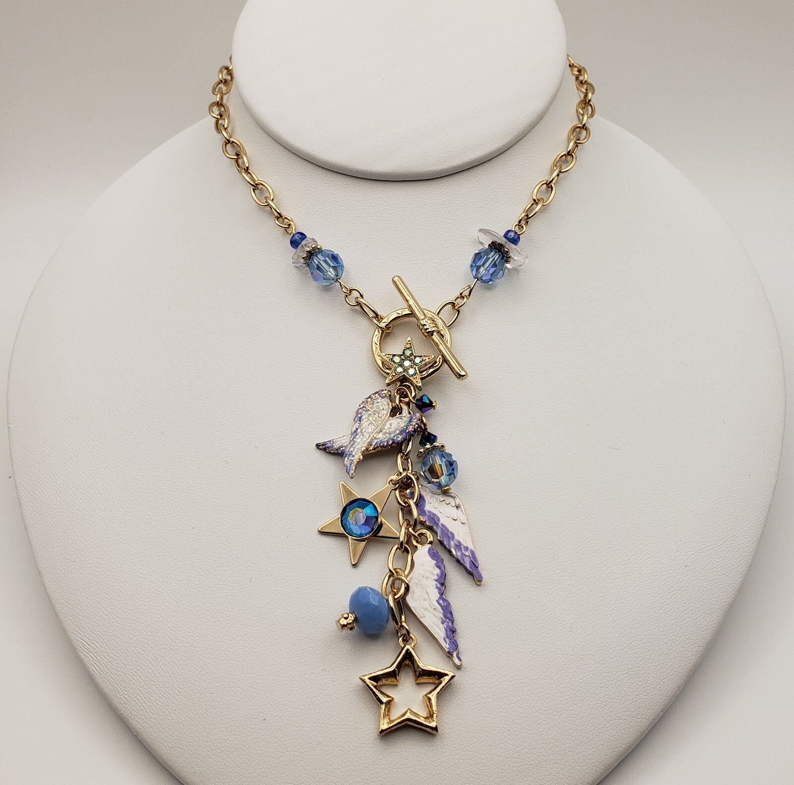 Kirks Folly Forever Angel Wings Charm Necklace Gold Tone 17in Long Blue Crystals