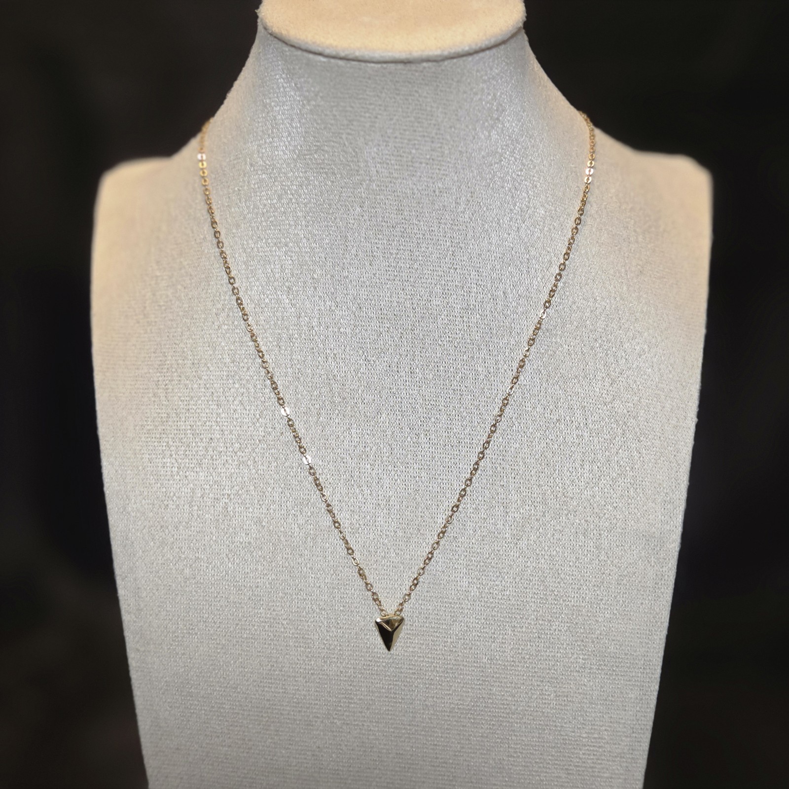 Delicate Gold-tone Necklace With Triangle Pendant.