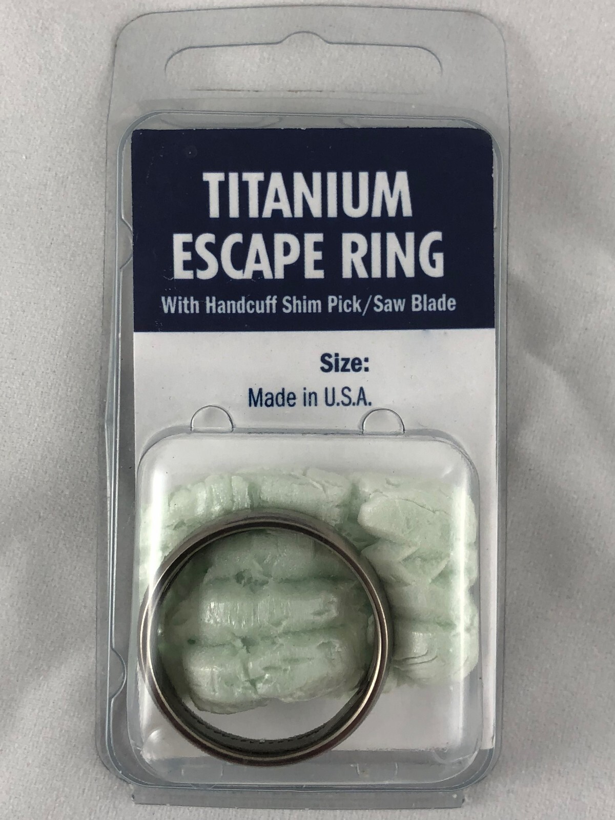 Titanium Escape Ring Contains a Saw and Handcuff Shim Pick Combination Tool