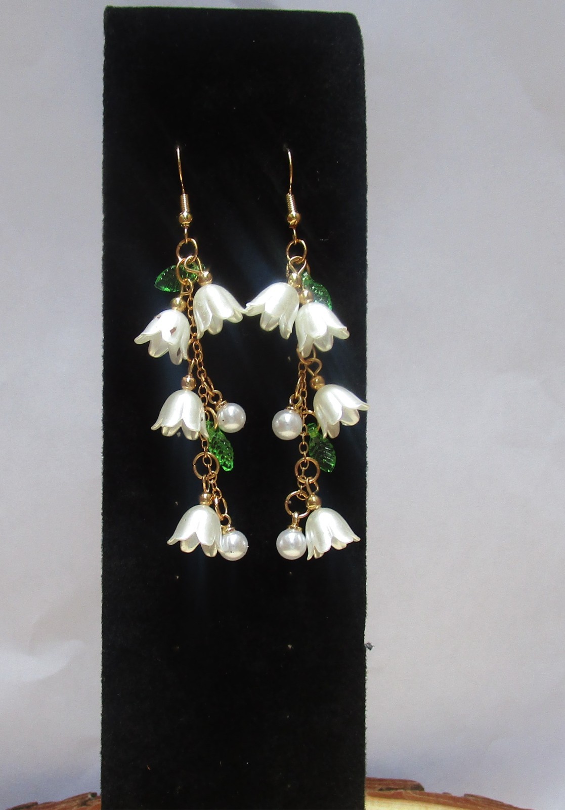 Women’s white flower dangle earrings with nickel free hooks
