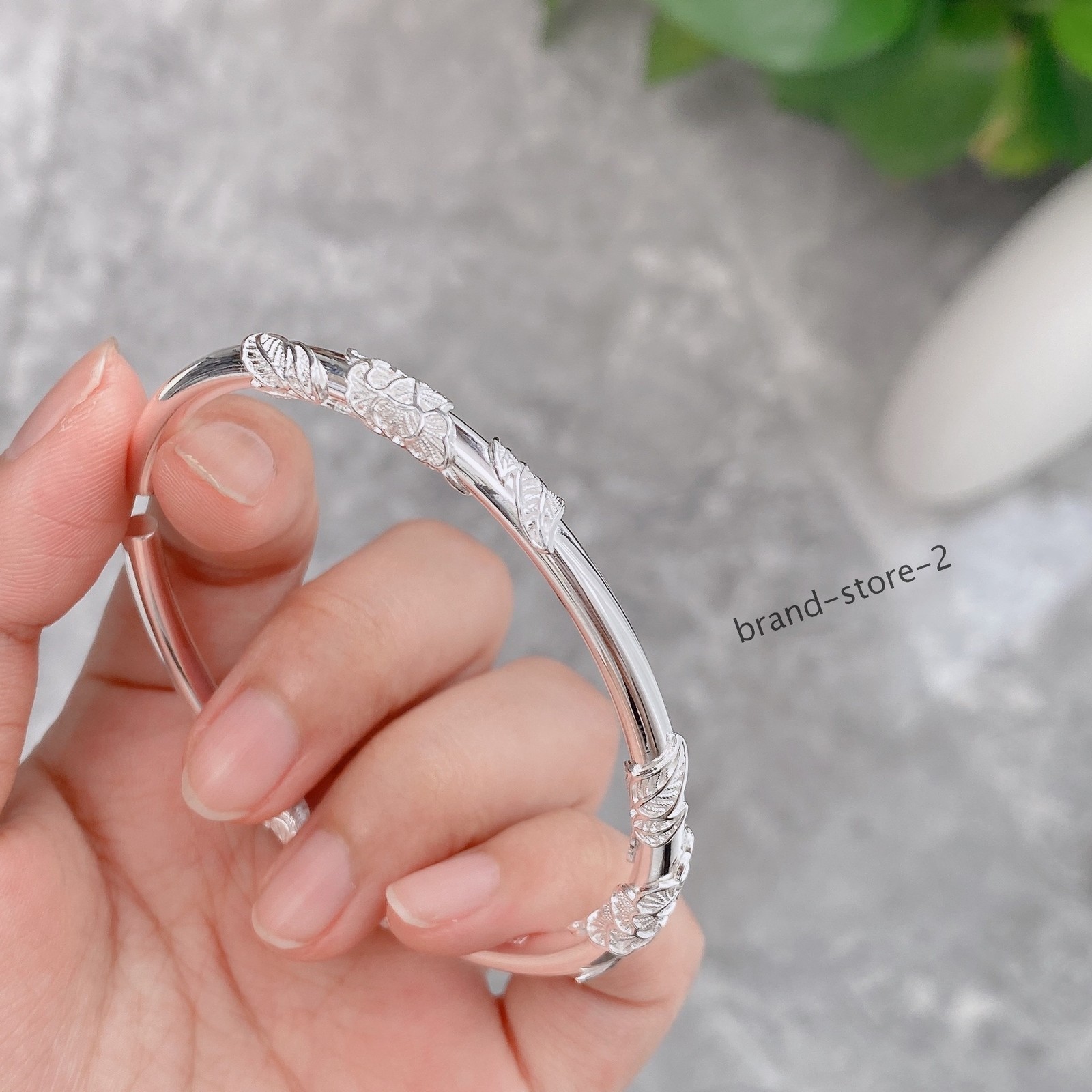 BM Round solid openwork relief copper-plated silver peony bracelet 30g