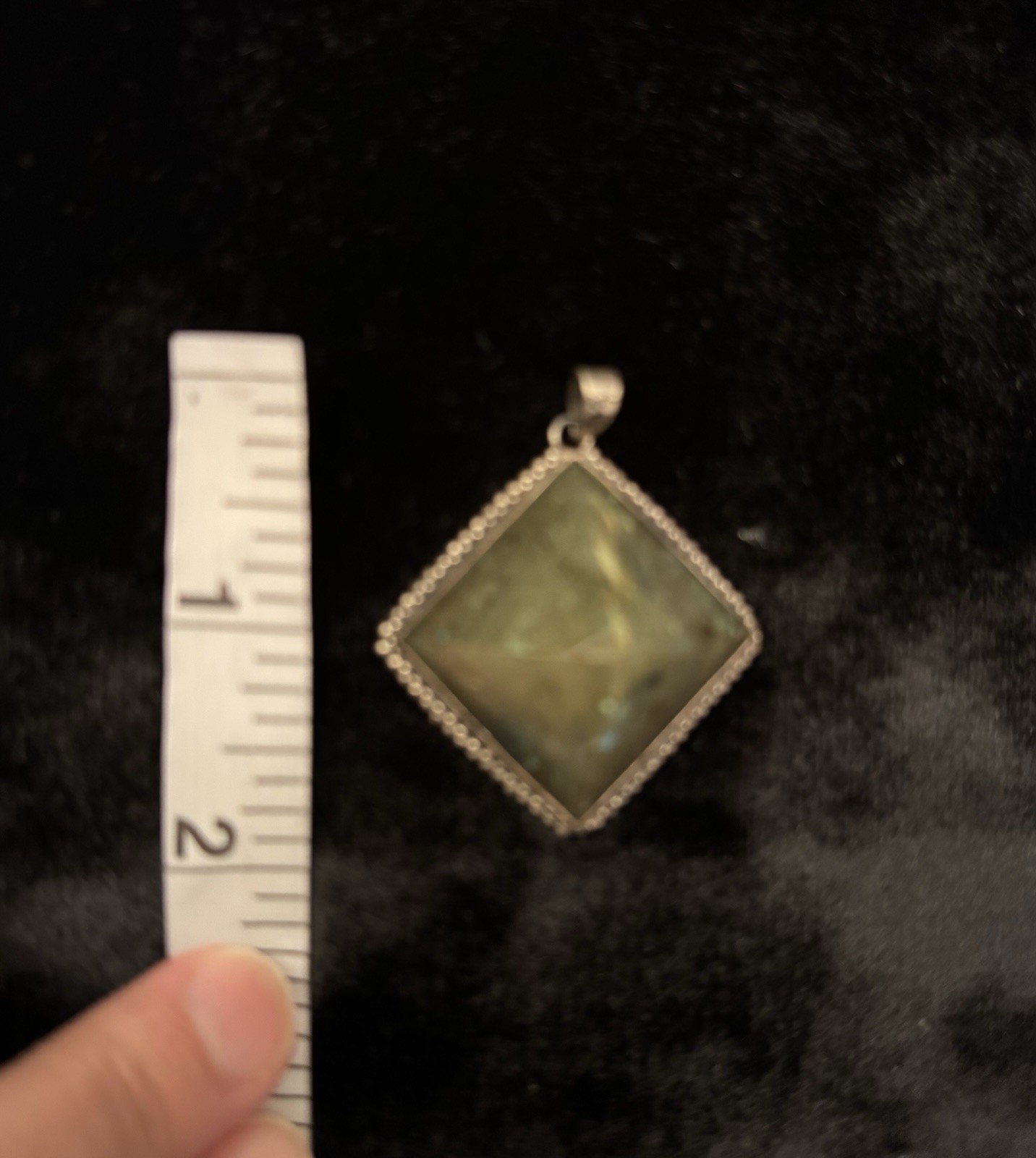Square-cut natural labradorite pendant set in a textured silver frame. Vintage.