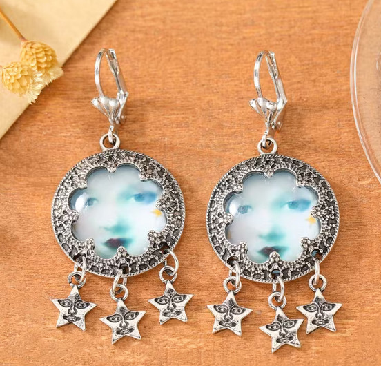 Moon face star charm earrings