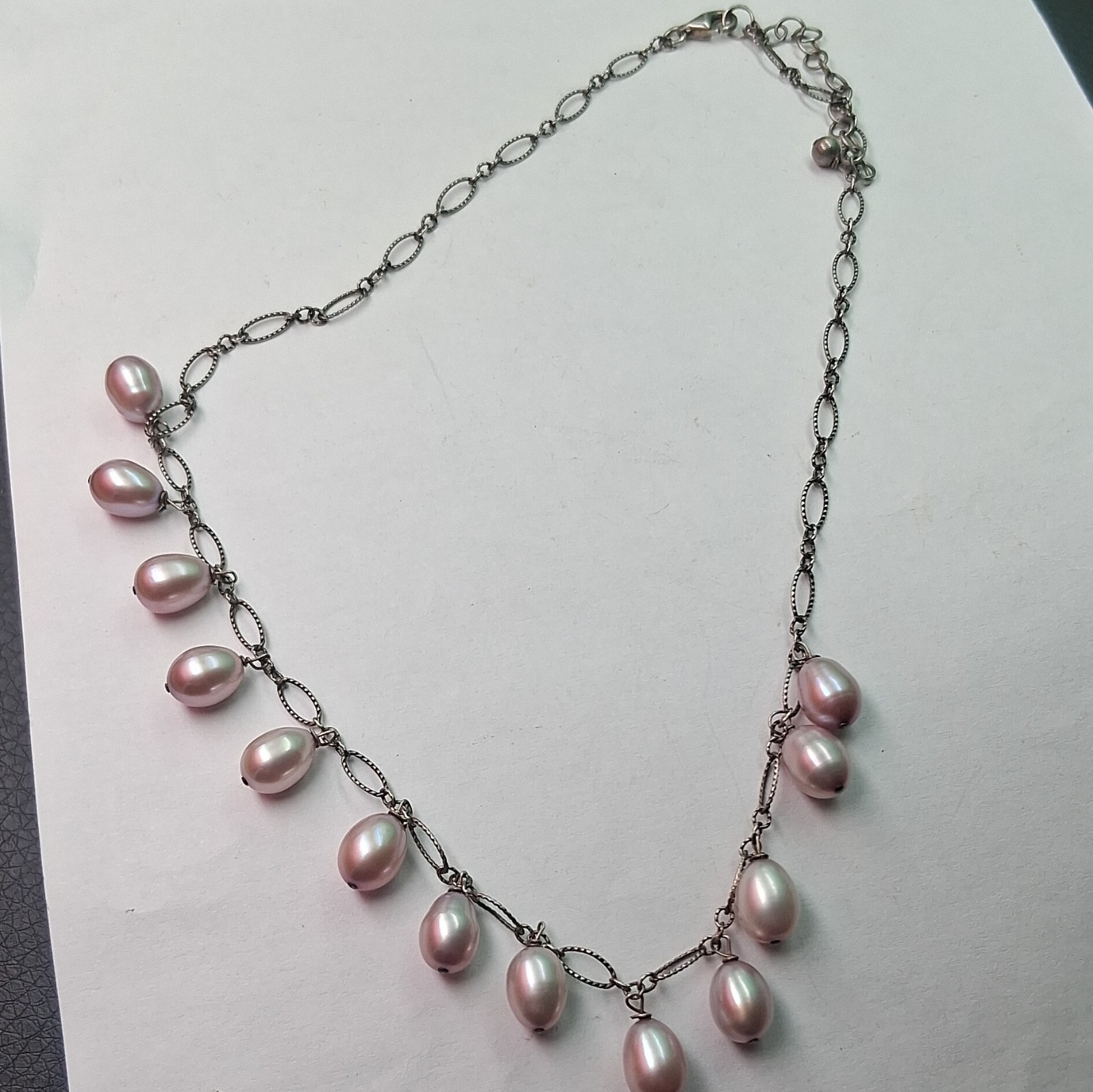 Sterling Silver Neckace whit a freshwater pearl oval link .