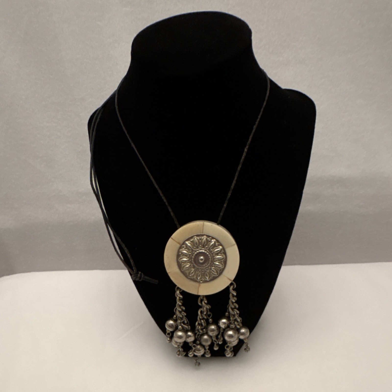 Vtg Round Cream & Silver Tone Charm Pendant Cord Necklace Silver Tone Dangles