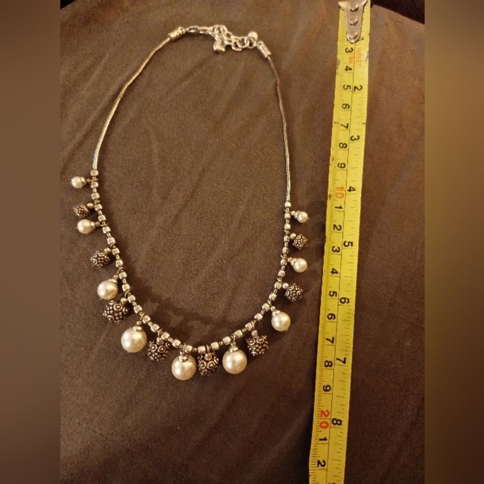 Brighton silver tone and faux pearl charm necklace