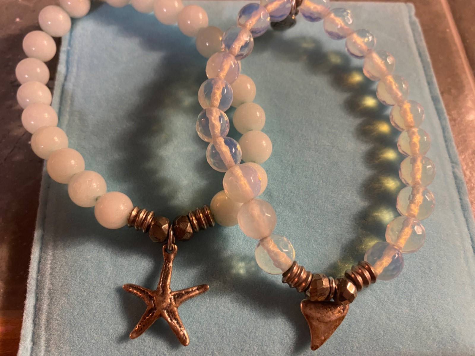 2 T Jazelle bracelets nautical , one starfish , one shark tooth regular size
