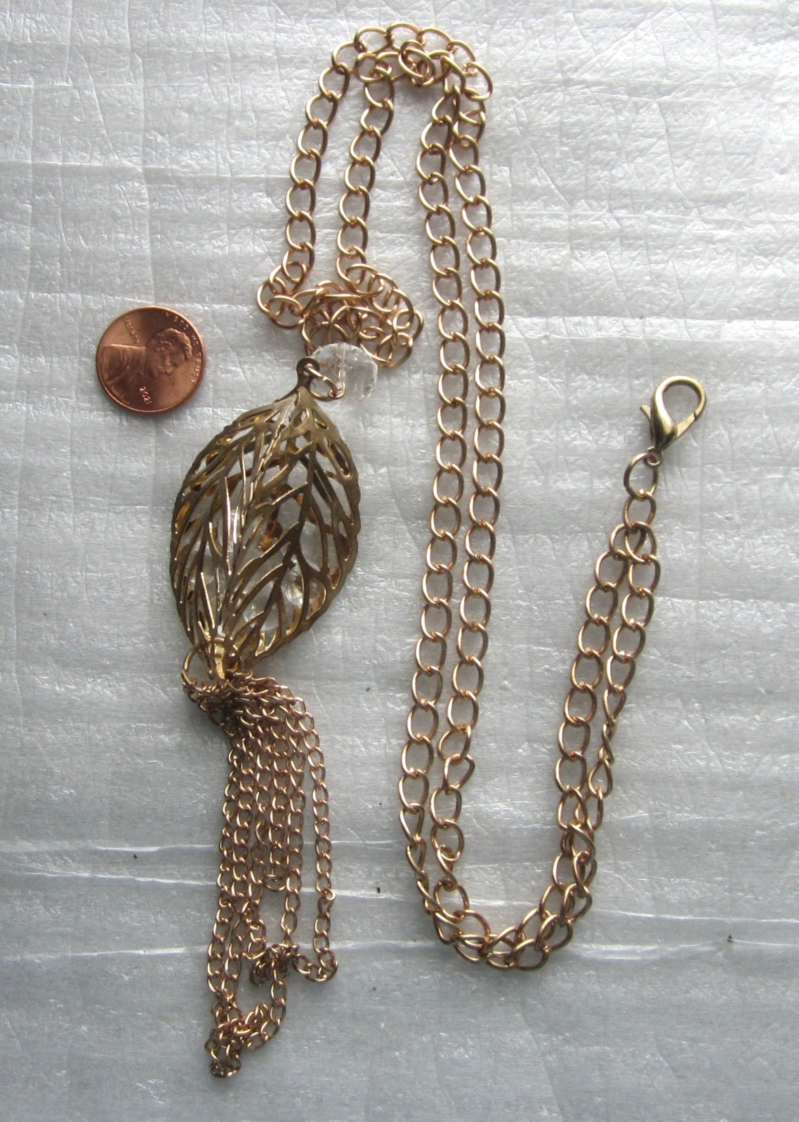 Filigree Gold Tone Leaf Pendant with Inside Clear Settings 30 in. Necklace