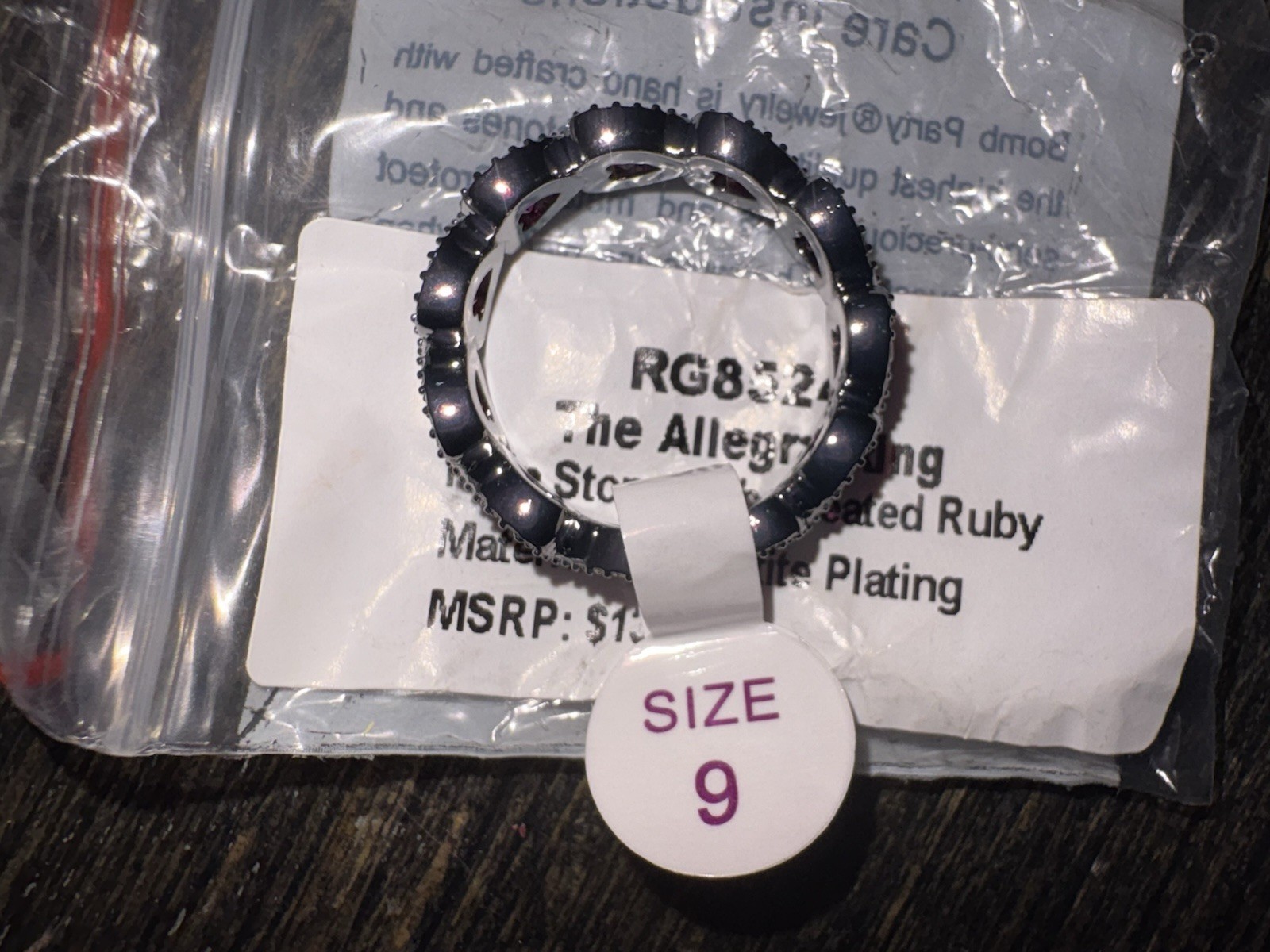 Bomb Party July 2026 Ruby Hematite Plated “The Allegra Ring” HEART RG85246 Sz 9