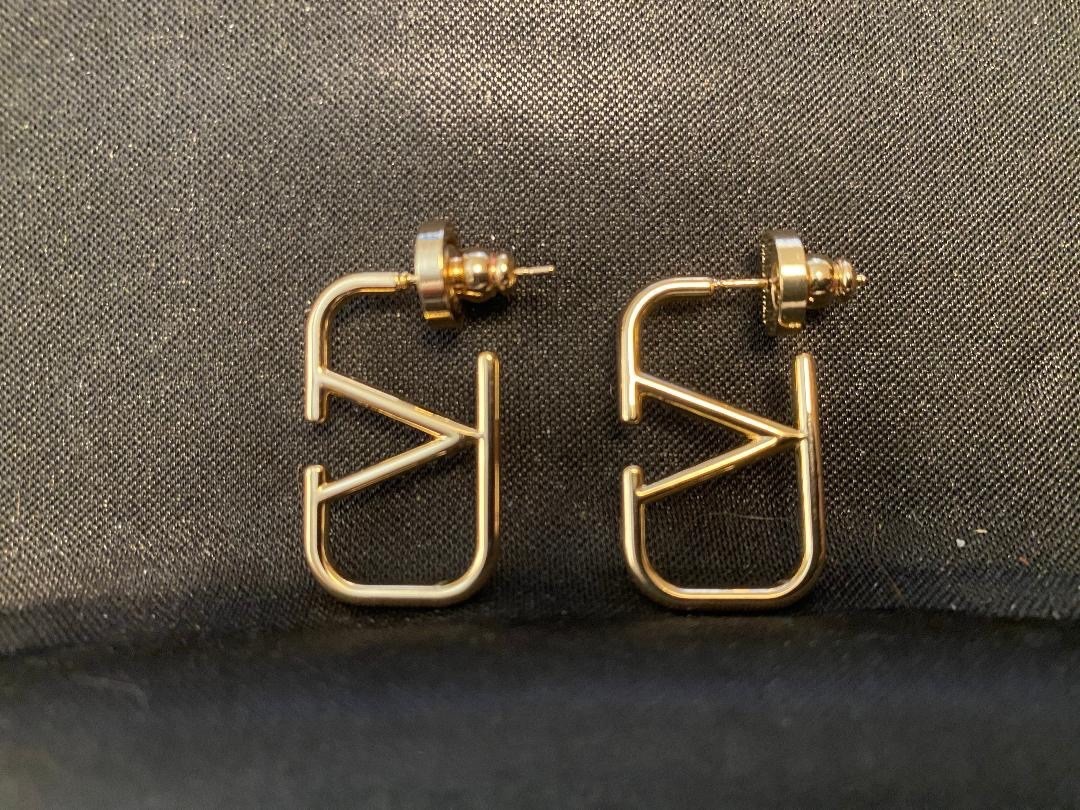Stunning Pre loved Womens Valentino Gold Tone V Logo Earrings.