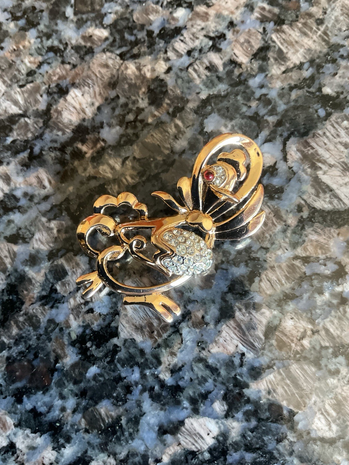 Crown Trifari Mother Goose with rhinestone egg brooch