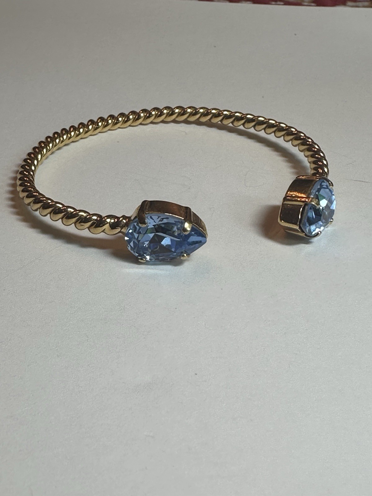 Caroline Svedbom Mini Drop Twisted Gold Tone Bracelet & Blue Swarovski Crystal