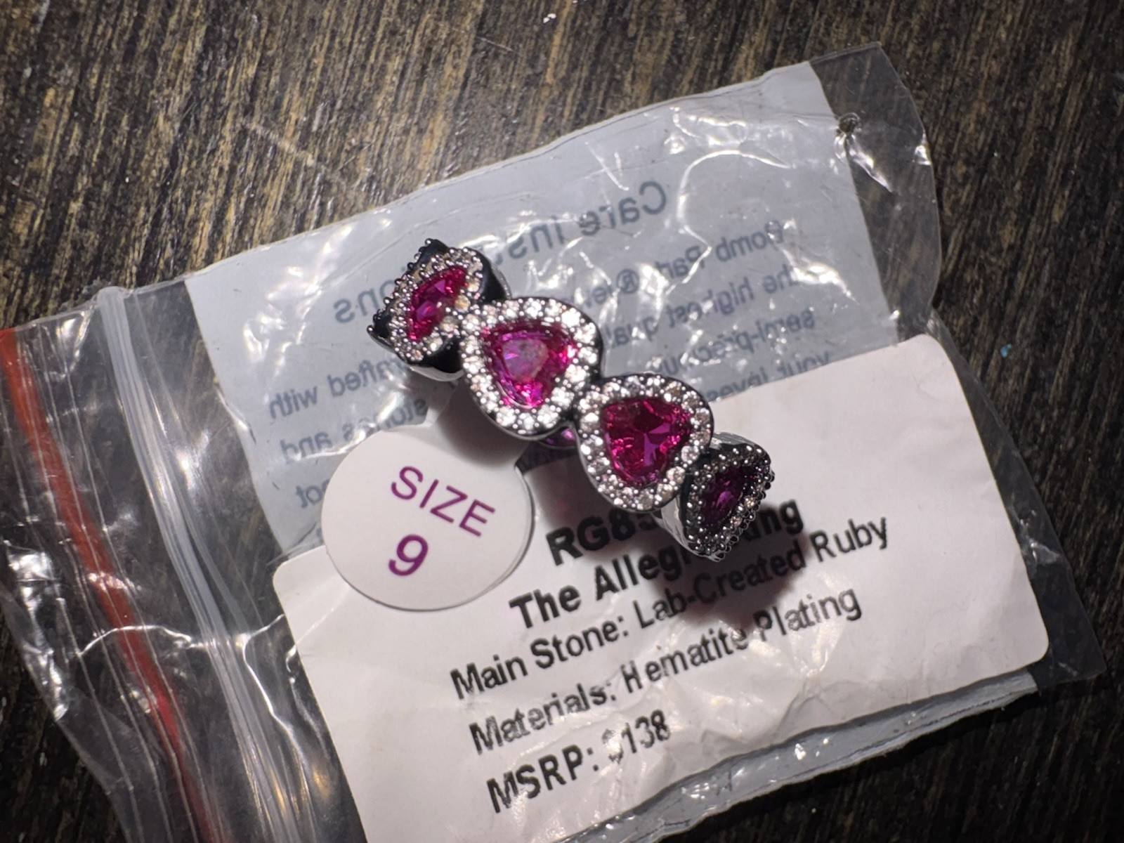 Bomb Party July 2026 Ruby Hematite Plated “The Allegra Ring” HEART RG85246 Sz 9