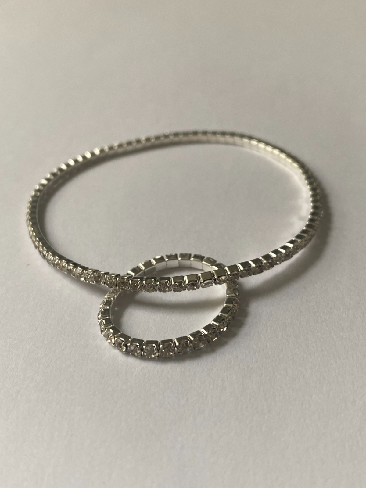 5 stretchy bracelets and 4 stretchy rings, shiny and new