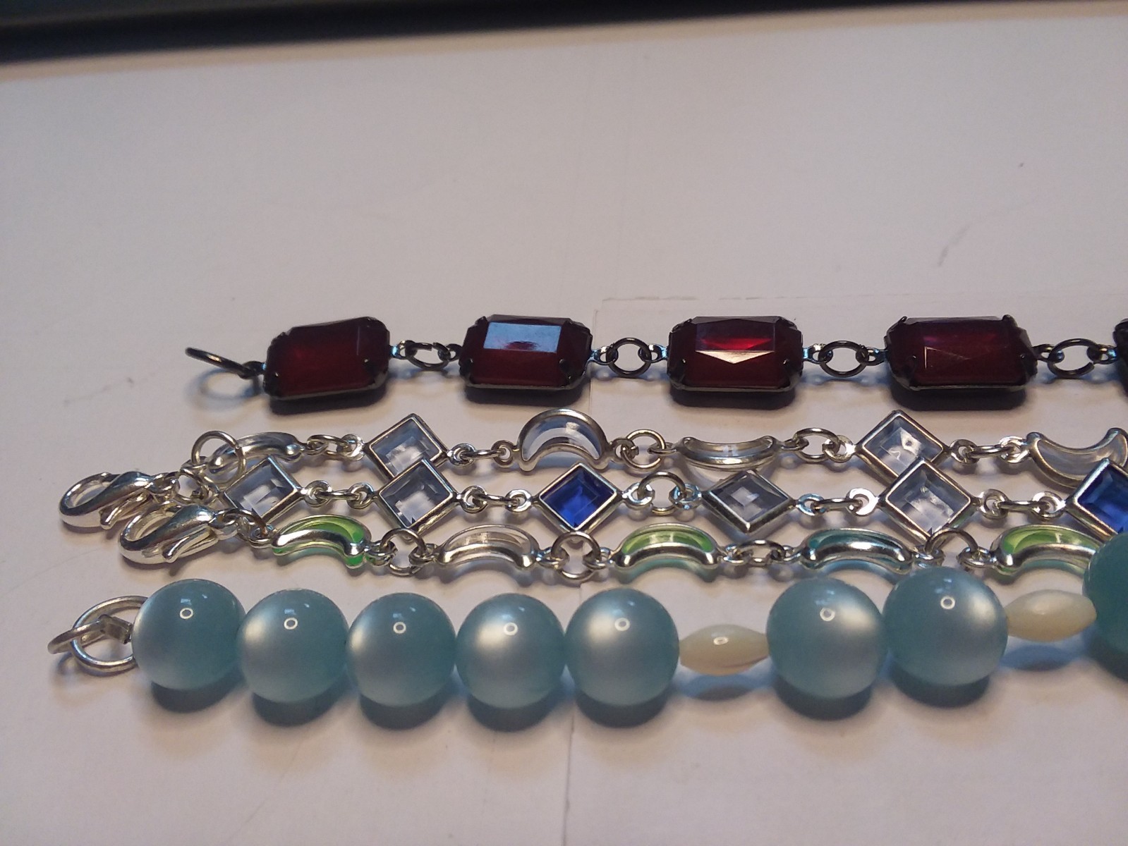 8 Bracelets: 3 Bracelets are Metal, 5 are Plastic 05-01-2026