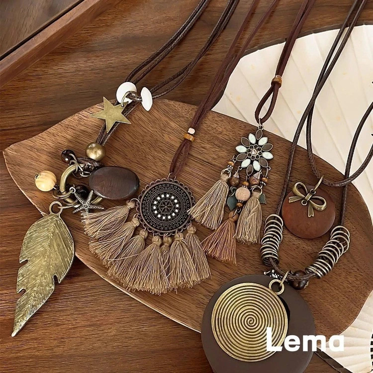 7Pcs Bohemian Women’s Necklace Set – Layered Cord Necklaces with Feather