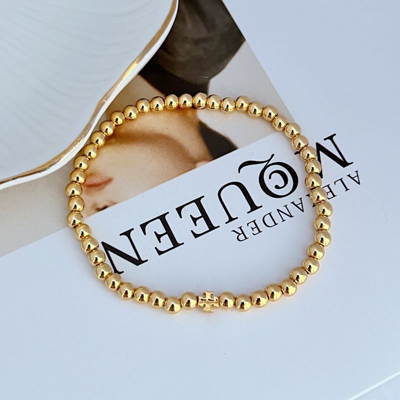 New Burch GOLD Elastic Bracelet Stretch Bracelet Double T Logo with Pouch
