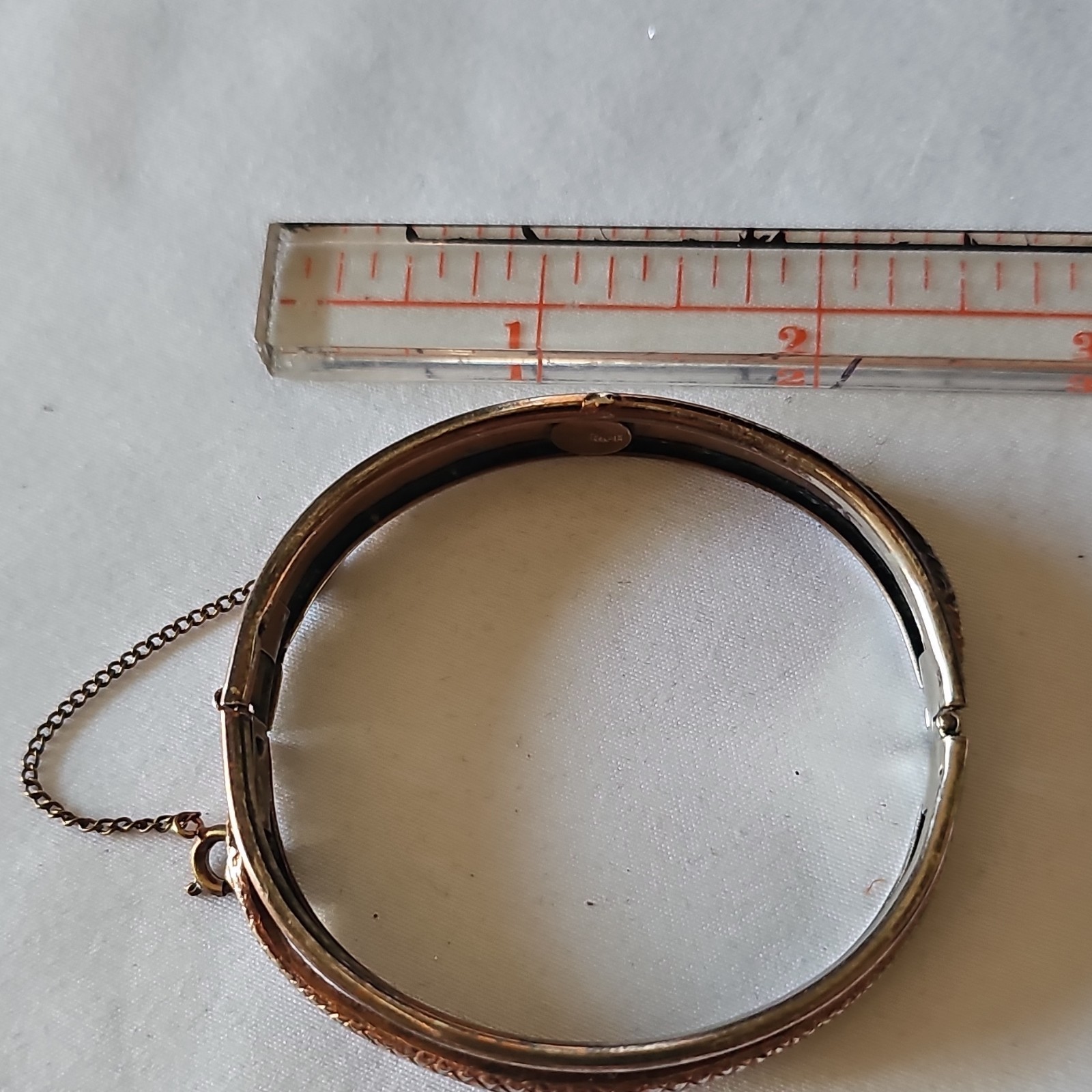 Frerich Signed Gold Tone Hinged Metal Bangle Bracelet w/ Safety Chain