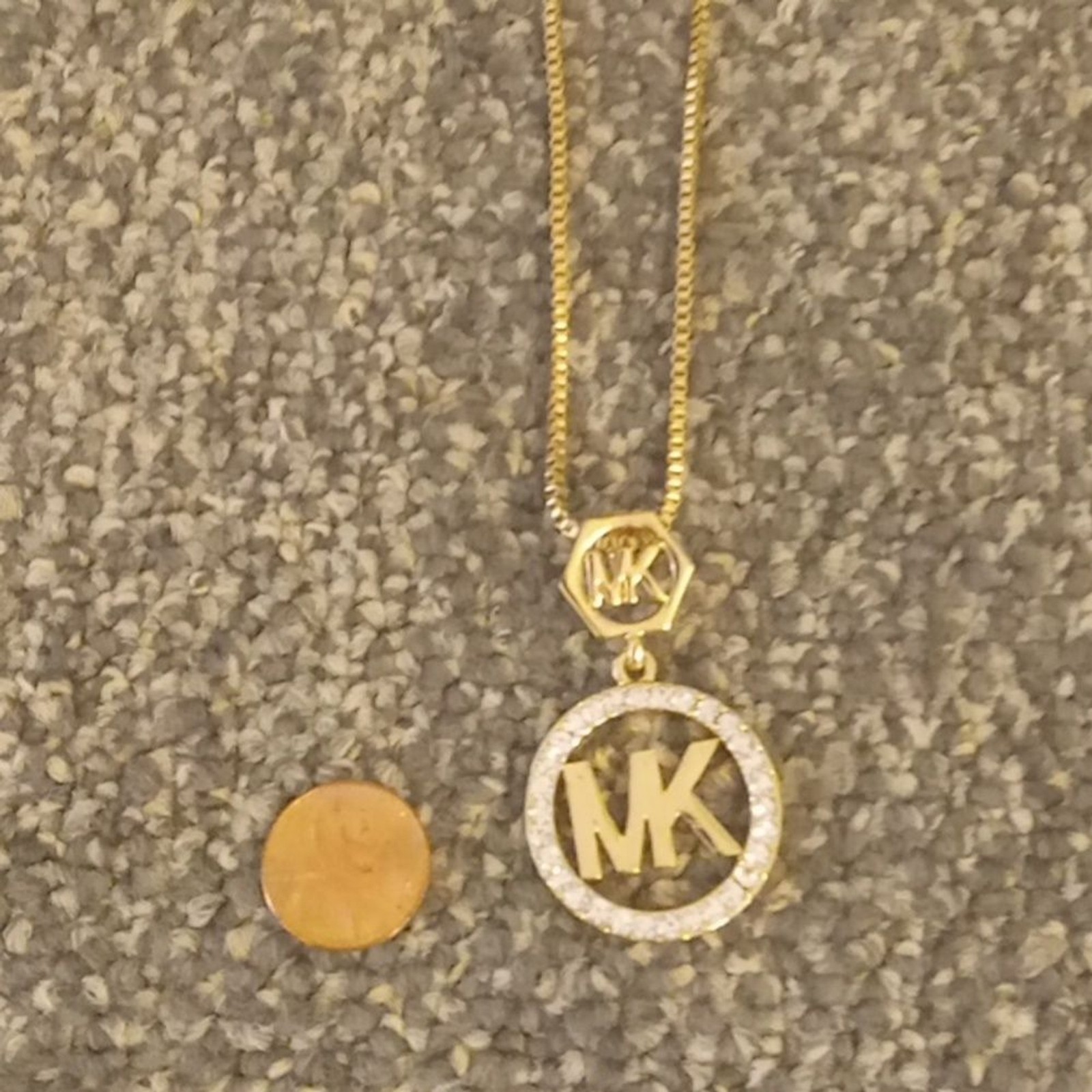 MK rhinestone and gold tone chain women’s necklace