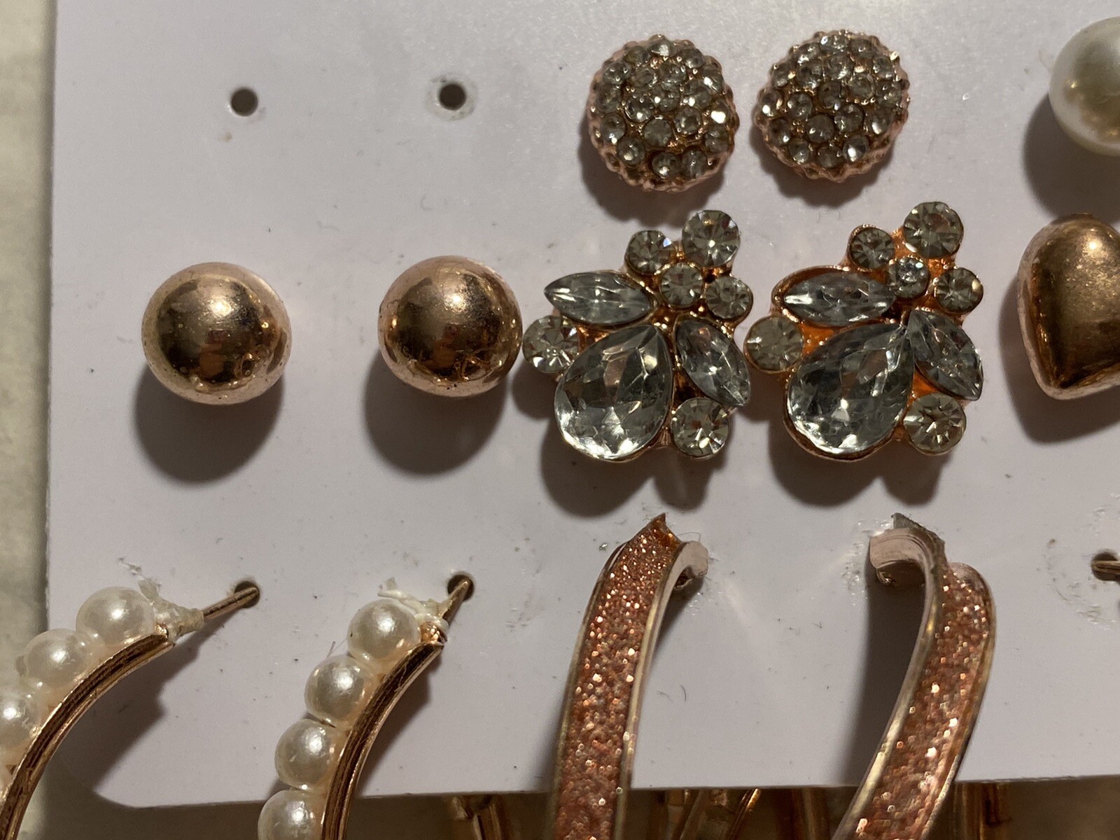 8 Pair Of Pierced Earrings On A Card