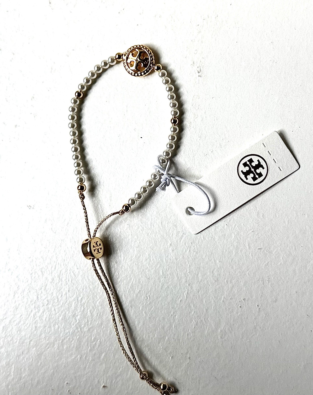 Tory Burch Rope Logo Slider Pearl Bracelet in Gold Sexy Fancy