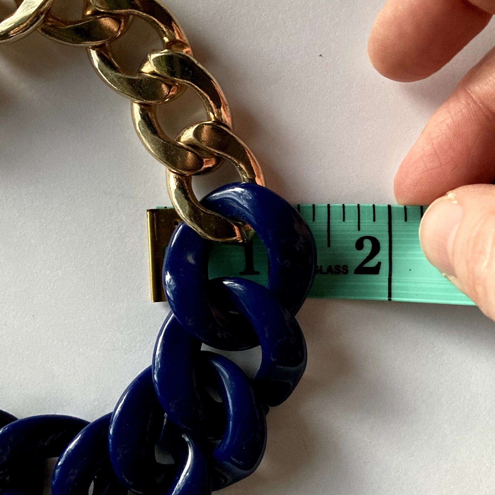 Gold tone and navy plastic / resin heavy chain link necklace