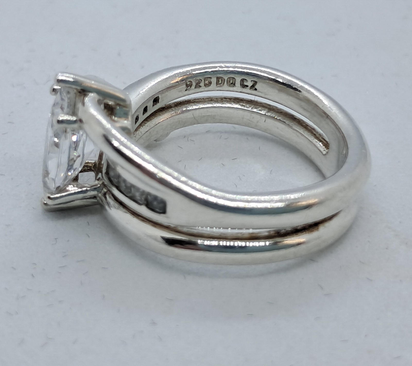 DIAMONIQUE STERLING SILVER RING WITH LARGE MARQUISE CZ & ROUND CZ ACCENTS SIZE 6