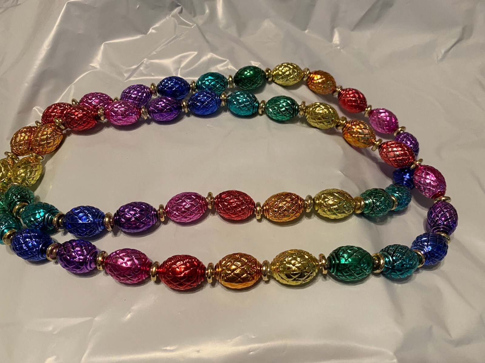 Beaded Necklace about 45 Inches long Pre owned in very good condition.