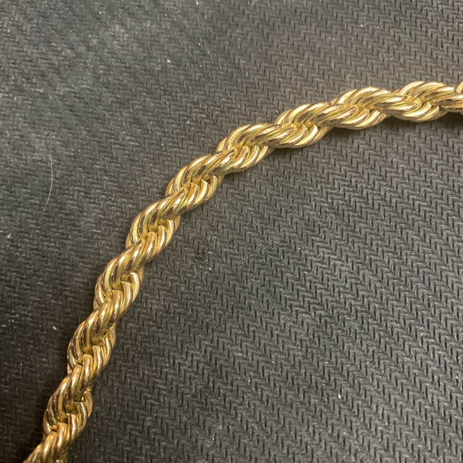 Twisted rope chain, gold color, 30 inches long, very good condition