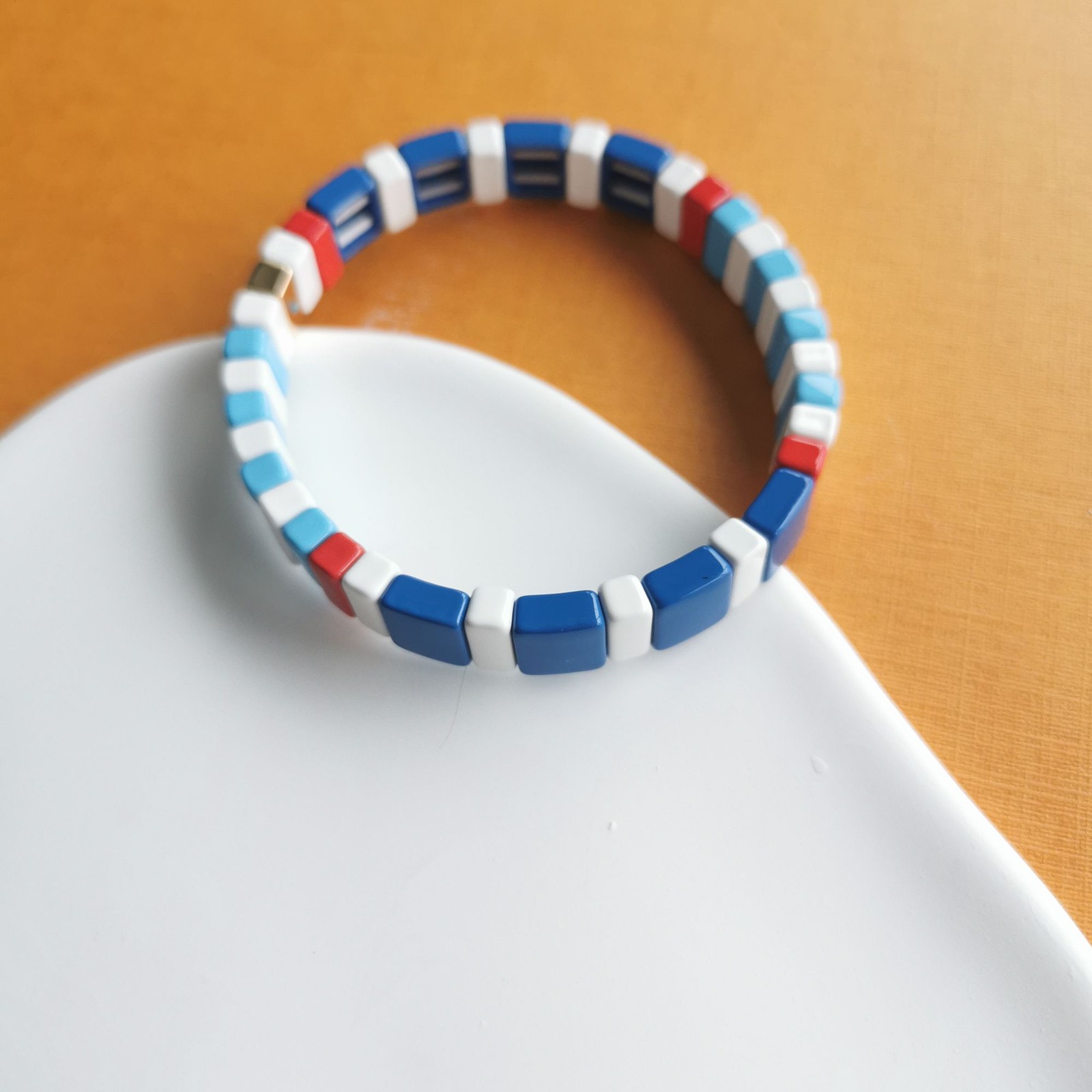 Roxanne Assoulin Rainbow Brite Gold Blue White Red Stretch Bracelet