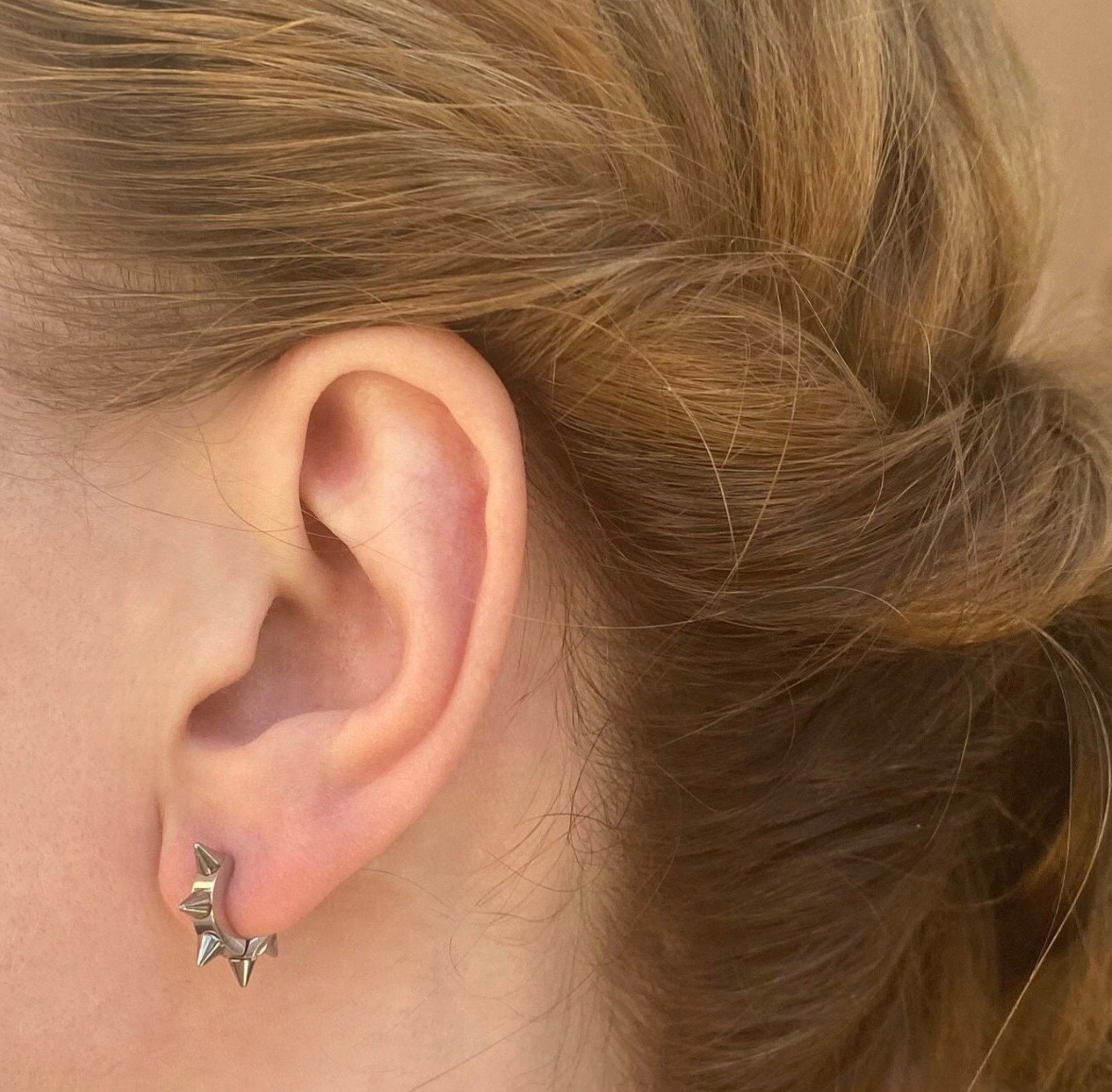 Silver Titanium Spike Huggie Hoop Earrings.