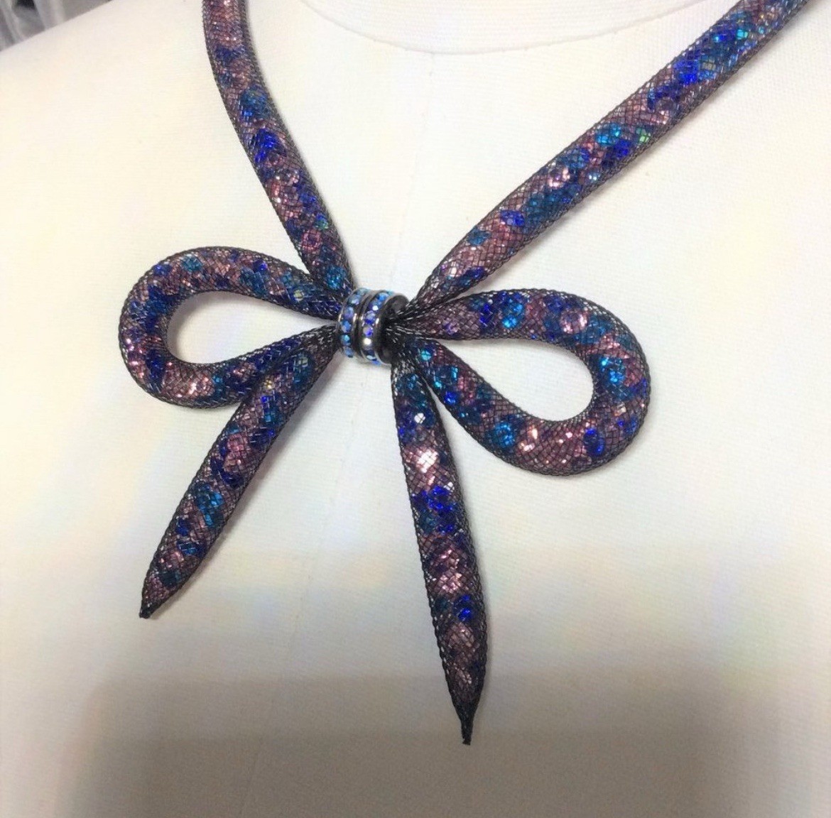 BETSEY JOHNSON’s Beautiful Blue And Pink Crystal Inlay Bow Lariat Necklace