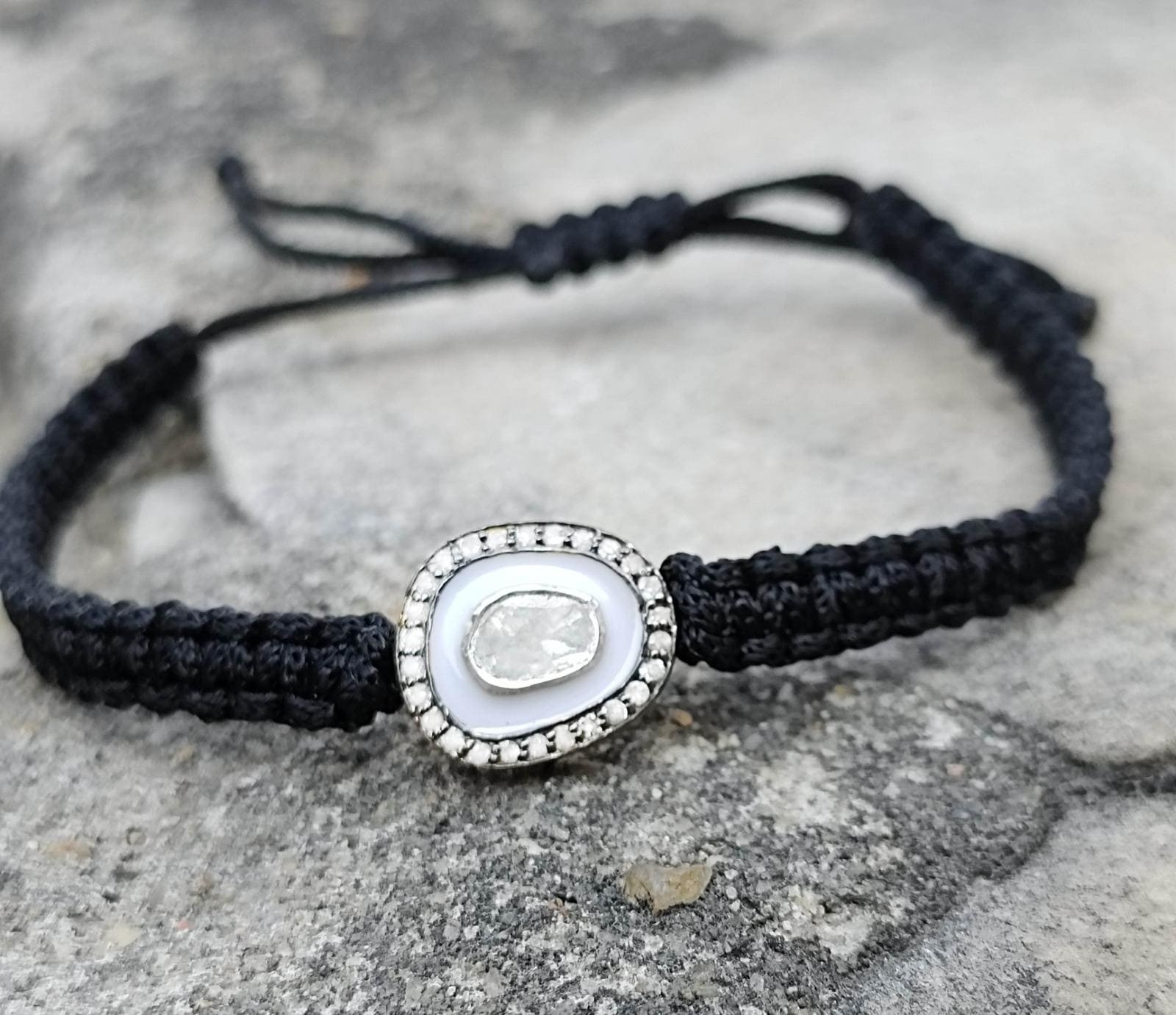 Natural Diamond White Enamel And Diamond Polki Adjustable Black Thread Bracelet.