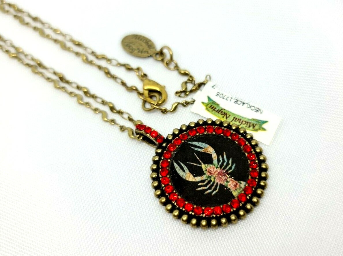 Lovely round Metal Necklace By Michal Negrin Red Crystal Cancer Sign.