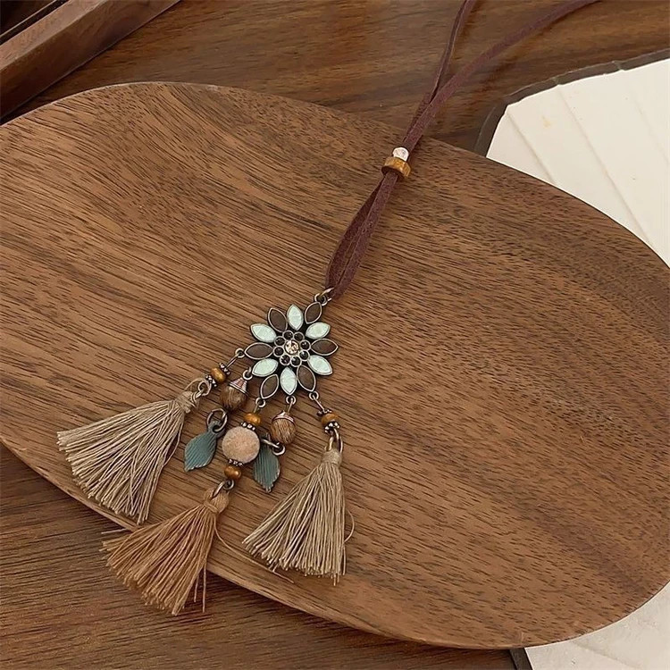 7Pcs Bohemian Women’s Necklace Set – Layered Cord Necklaces with Feather