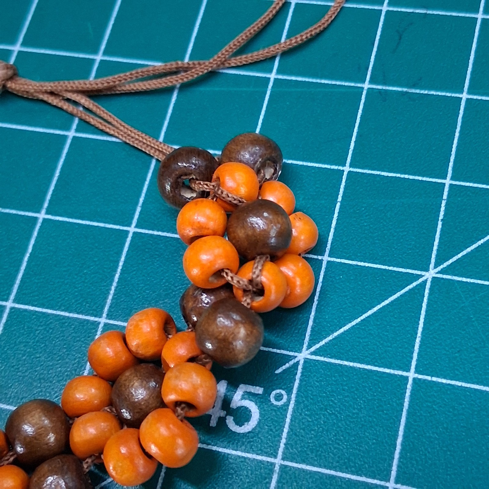 Orange & Natural Wood Channel Set Bead Adjustable Size Brown Cord Bracelet