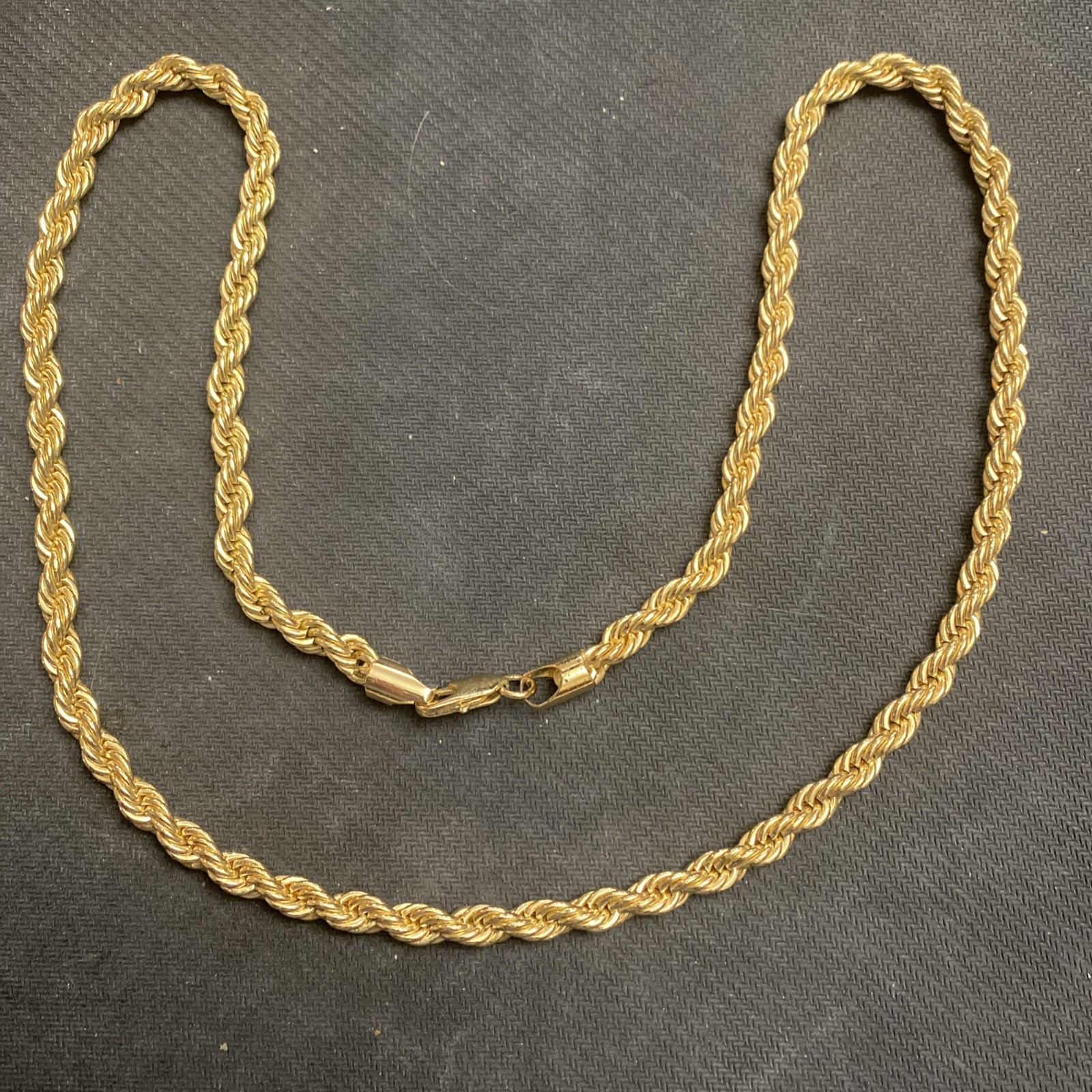 Twisted rope chain, gold color, 30 inches long, very good condition