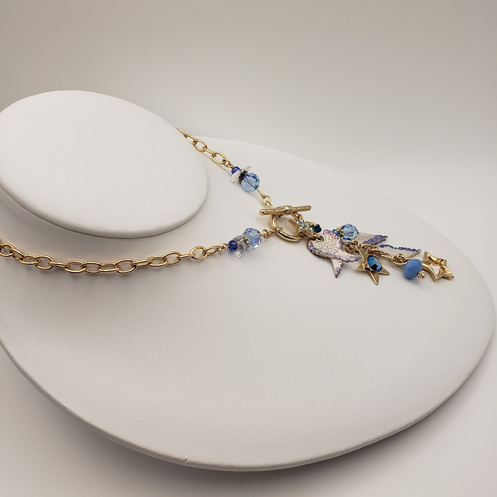 Kirks Folly Forever Angel Wings Charm Necklace Gold Tone 17in Long Blue Crystals