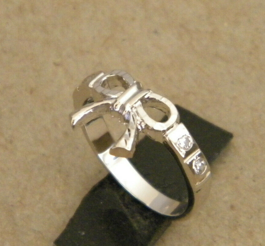 Girl Lady’s Women’s Rhodium Plated 4 Clear CZ & Bow Ring Size 7.5 New