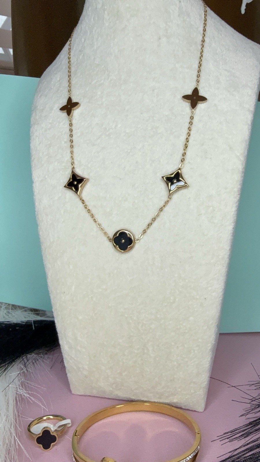 Gold Tone Clover Pendant Cable Chain Necklace with Black Accents